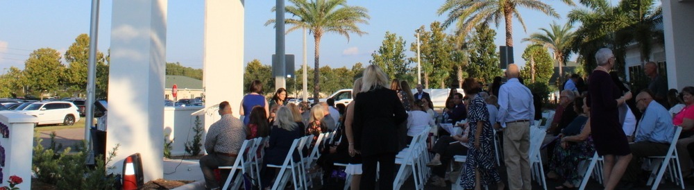 Guests await program start at grand opening of new care center