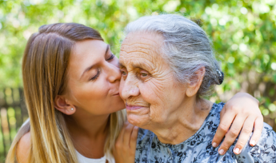 Kissing a cheek photo
