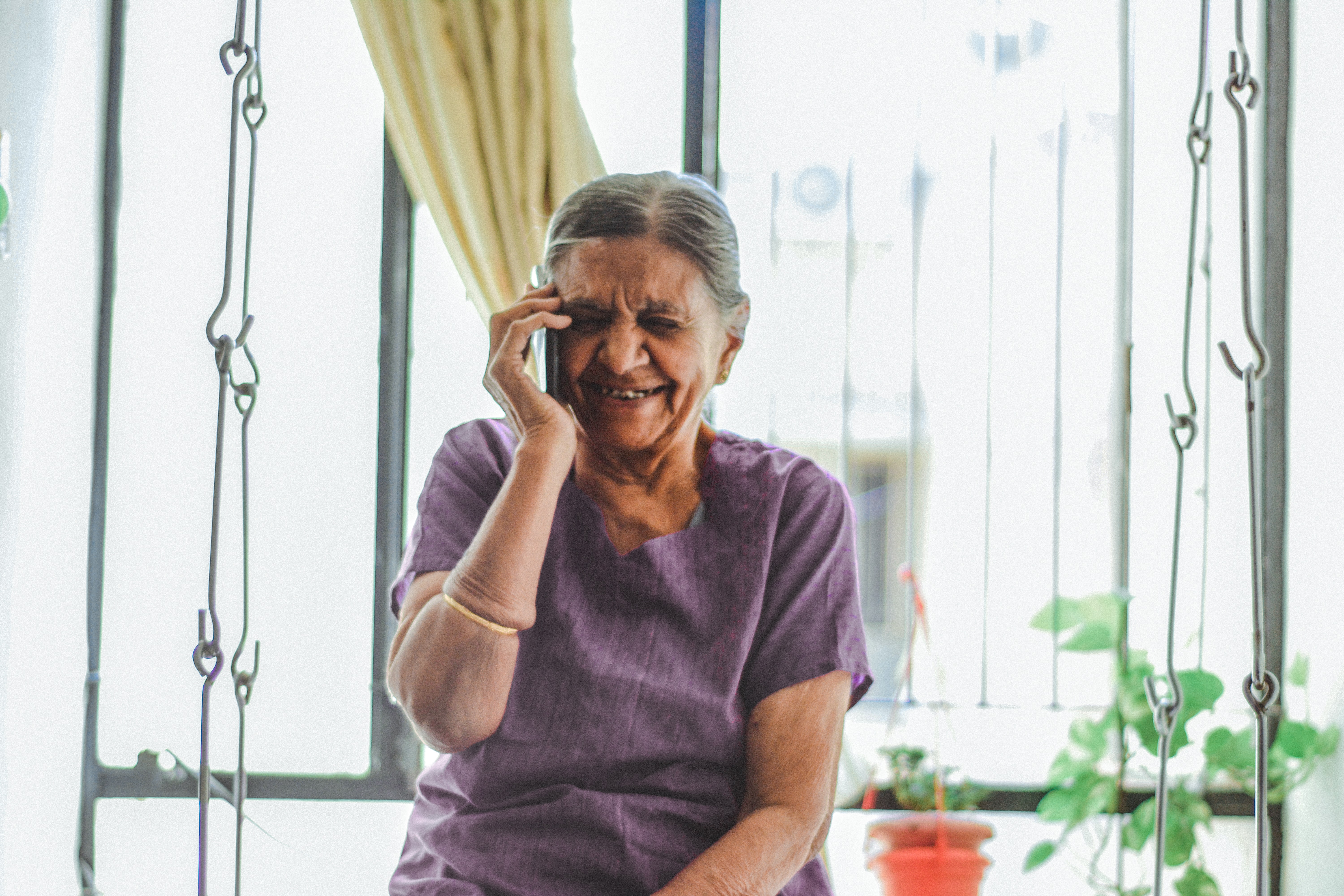 caregiver talking on phone support call